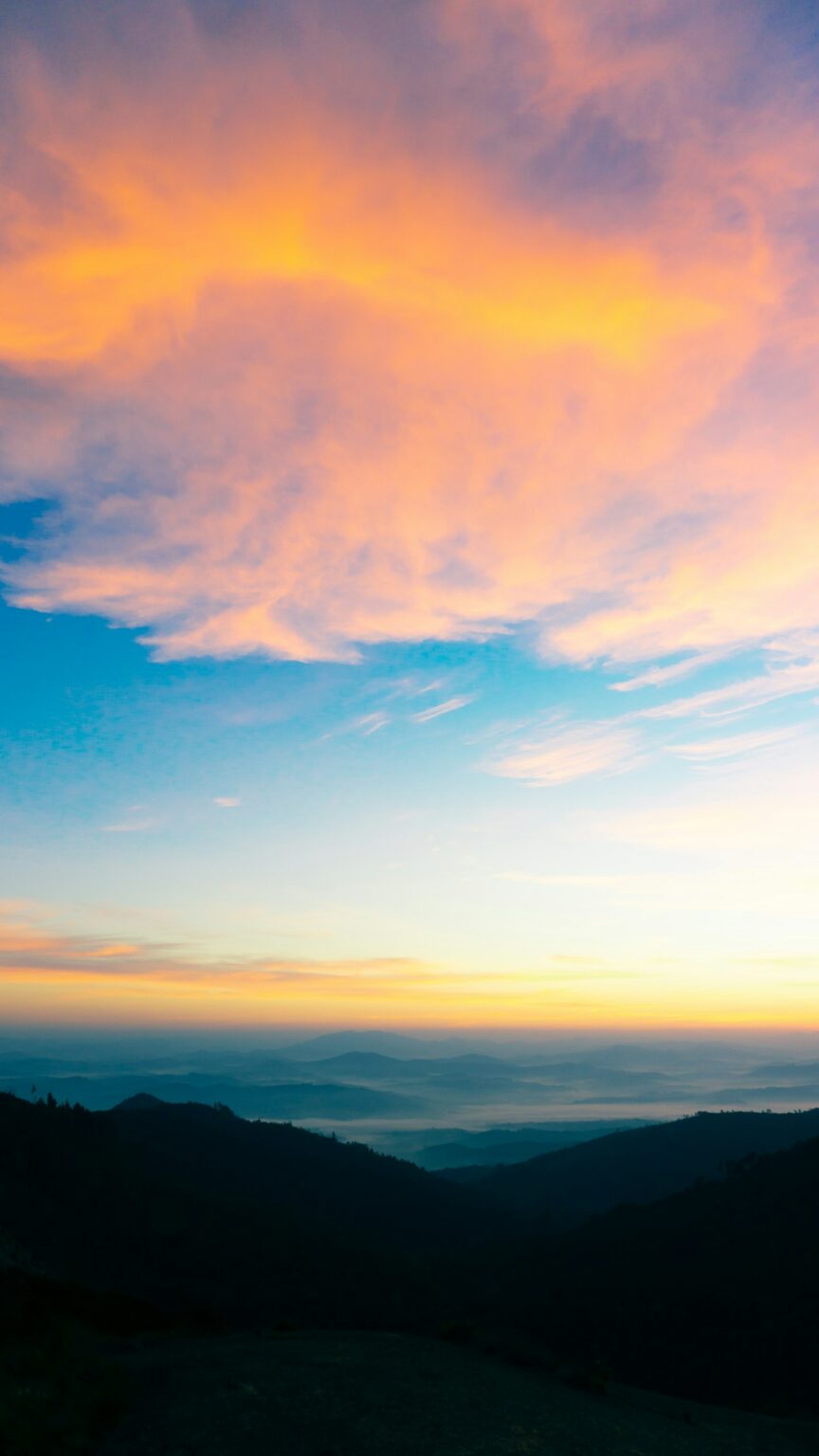 Sunrise breaking over a mountain ridge